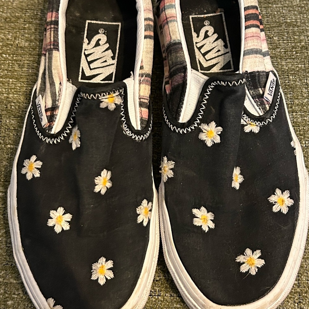 Women’s slip on vans with plaid and daisies